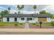 A well-maintained single Gathering house features updated landscaping and a welcoming walkway to the front door at 5937 E Corrine Dr, Scottsdale, AZ 85254