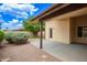 Covered back patio provides a shaded outdoor space with views of the landscaped backyard at 6420 W Beverly Ln, Glendale, AZ 85306