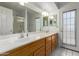 Bathroom featuring double sinks, ample counter space, and a bright, inviting atmosphere at 6420 W Beverly Ln, Glendale, AZ 85306