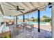 Inviting outdoor patio with comfortable seating, string lights, and a large pool perfect for entertaining and relaxation at 6808 N 11Th St, Phoenix, AZ 85014