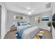 Charming bedroom featuring vibrant decor, ample natural light from three windows, and modern furnishings at 6808 N 11Th St, Phoenix, AZ 85014