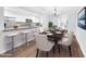 Beautiful dining area with a breakfast bar and modern chandelier at 6808 N 11Th St, Phoenix, AZ 85014