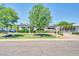 Charming single story home boasting mature landscaping, a green lawn, and covered parking at 6808 N 11Th St, Phoenix, AZ 85014