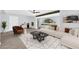 Bright living room featuring a modern sofa, unique arched window, and stylish decor at 6808 N 11Th St, Phoenix, AZ 85014