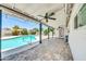 Spacious covered patio with ceiling fans overlooking the beautiful pool at 6808 N 11Th St, Phoenix, AZ 85014