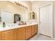 Bright bathroom features a double sink vanity, neutral walls and lots of mirror space at 7031 S 32Nd Pl, Phoenix, AZ 85042