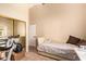 Bedroom offers lots of natural light, has neutral walls and tiled floors at 7031 S 32Nd Pl, Phoenix, AZ 85042