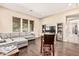 Open-concept living room with hardwood floors and backyard view at 7242 W Rowel Rd, Peoria, AZ 85383