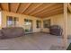 Covered patio with furniture perfect for outdoor entertaining at 764 E Shannon St, Chandler, AZ 85225
