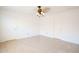 Living Room with neutral walls, tile floor, bright lighting fixture, and access to two separate entryways at 8055 W Sanna St, Peoria, AZ 85345