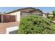 Charming single-story home with two-car garage and low maintenance desert landscaping at 8256 W Bloomfield Rd, Peoria, AZ 85381