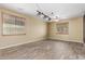 Bright living room featuring two windows, offering a relaxing atmosphere at 8256 W Bloomfield Rd, Peoria, AZ 85381
