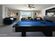Spacious game room featuring a pool table and comfortable seating at 8750 E Starlight Way, Scottsdale, AZ 85250