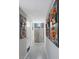 Inviting hallway adorned with unique artwork, showcasing a contemporary design aesthetic at 8750 E Starlight Way, Scottsdale, AZ 85250
