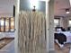 Hallway to bedrooms with stylish decorative elements at 8750 E Starlight Way, Scottsdale, AZ 85250
