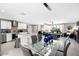 Open-concept living space with a pool table, dining area, and contemporary decor, perfect for entertaining at 8750 E Starlight Way, Scottsdale, AZ 85250