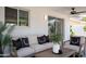 Relaxing outdoor patio with comfortable seating and a ceiling fan, perfect for enjoying the outdoors at 8750 E Starlight Way, Scottsdale, AZ 85250