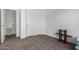 A room with a neutral color scheme, carpet flooring, and a closet at 8832 E Pueblo Ave # 71, Mesa, AZ 85208