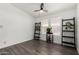 Bright room featuring stylish shelves, laminate floors, and natural light from multiple windows at 8832 E Pueblo Ave # 71, Mesa, AZ 85208