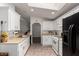 Bright kitchen with white cabinetry, appliances, and bright natural lighting at 8832 E Pueblo Ave # 71, Mesa, AZ 85208