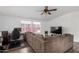 Bright living room featuring neutral tones, a large sectional sofa, and modern media setup at 8832 E Pueblo Ave # 71, Mesa, AZ 85208
