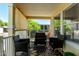 Inviting outdoor porch with comfortable seating and pleasant views of the neighborhood at 8832 E Pueblo Ave # 71, Mesa, AZ 85208