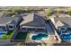 Aerial view of the home showcasing a private backyard with a pool, covered patio, and desert landscaping at 10253 E Indigo Dr, Scottsdale, AZ 85255