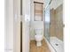 Toilet and tiled stand-up shower with glass doors in this bathroom at 10253 E Indigo Dr, Scottsdale, AZ 85255