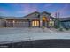 Attractive single-story home boasting desert landscaping, a stucco exterior, and spacious three-car garage at 10253 E Indigo Dr, Scottsdale, AZ 85255