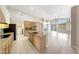 Spacious kitchen with an island, stainless steel appliances, and tile flooring at 10253 E Indigo Dr, Scottsdale, AZ 85255