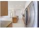 Bright kitchen with an island, stainless steel appliances, and tile flooring at 10253 E Indigo Dr, Scottsdale, AZ 85255