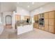 Bright kitchen with an island, stainless steel appliances, and tile flooring at 10253 E Indigo Dr, Scottsdale, AZ 85255