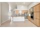Bright kitchen with an island, stainless steel appliances, and tile flooring at 10253 E Indigo Dr, Scottsdale, AZ 85255