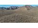 Picture of scenic desert landscape featuring mountain views, shrubs, and rugged terrain at 10253 E Indigo Dr, Scottsdale, AZ 85255
