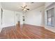 Open living room featuring wood flooring, neutral paint, and lots of natural light at 10253 E Indigo Dr, Scottsdale, AZ 85255