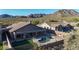 Gorgeous home featuring a private pool, fenced yard, covered patio, and stunning mountain views at 10253 E Indigo Dr, Scottsdale, AZ 85255