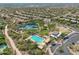 Community aerial view with pickleball, pool, clubhouse and water feature at 10591 E Morning Star Dr, Scottsdale, AZ 85255