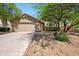 Charming single story home with a two car garage and xeriscape landscaping at 10591 E Morning Star Dr, Scottsdale, AZ 85255