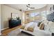 Spacious primary bedroom includes a sitting area, a large dresser, and an ensuite bathroom at 10591 E Morning Star Dr, Scottsdale, AZ 85255