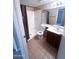Functional bathroom featuring a shower, toilet, sink vanity, and neutral flooring at 1075 E Chandler Blvd # 220, Chandler, AZ 85225