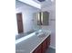 Bright bathroom features a spacious vanity, mirror and two separate towel racks at 1075 E Chandler Blvd # 220, Chandler, AZ 85225