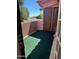 Balcony with turf and an exterior door leading to the outside at 1075 E Chandler Blvd # 220, Chandler, AZ 85225