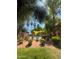 Pool with shade canopies surrounded by trees and a low black metal fence at 1075 E Chandler Blvd # 220, Chandler, AZ 85225
