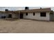 A backyard with a covered patio area with cement and sand at 11802 N 25Th Ave, Phoenix, AZ 85029