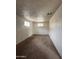 Bedroom with carpeted floor and a window, offering ample natural light at 11802 N 25Th Ave, Phoenix, AZ 85029