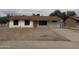 Charming single-story home with a spacious front yard and a quaint exterior at 11802 N 25Th Ave, Phoenix, AZ 85029
