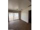 Bright living room with sliding glass doors leading to the backyard at 11802 N 25Th Ave, Phoenix, AZ 85029