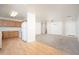 Open-concept kitchen with white appliances and wood cabinets at 11845 W Edgemont Ave, Avondale, AZ 85392