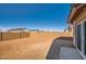 Spacious backyard featuring a block wall and plenty of room to create your dream outdoor space at 12013 E Primrose Ln, Florence, AZ 85132