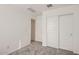 Bedroom with carpet, double closets and an open doorway at 12142 E Sunflower Ln, Florence, AZ 85132